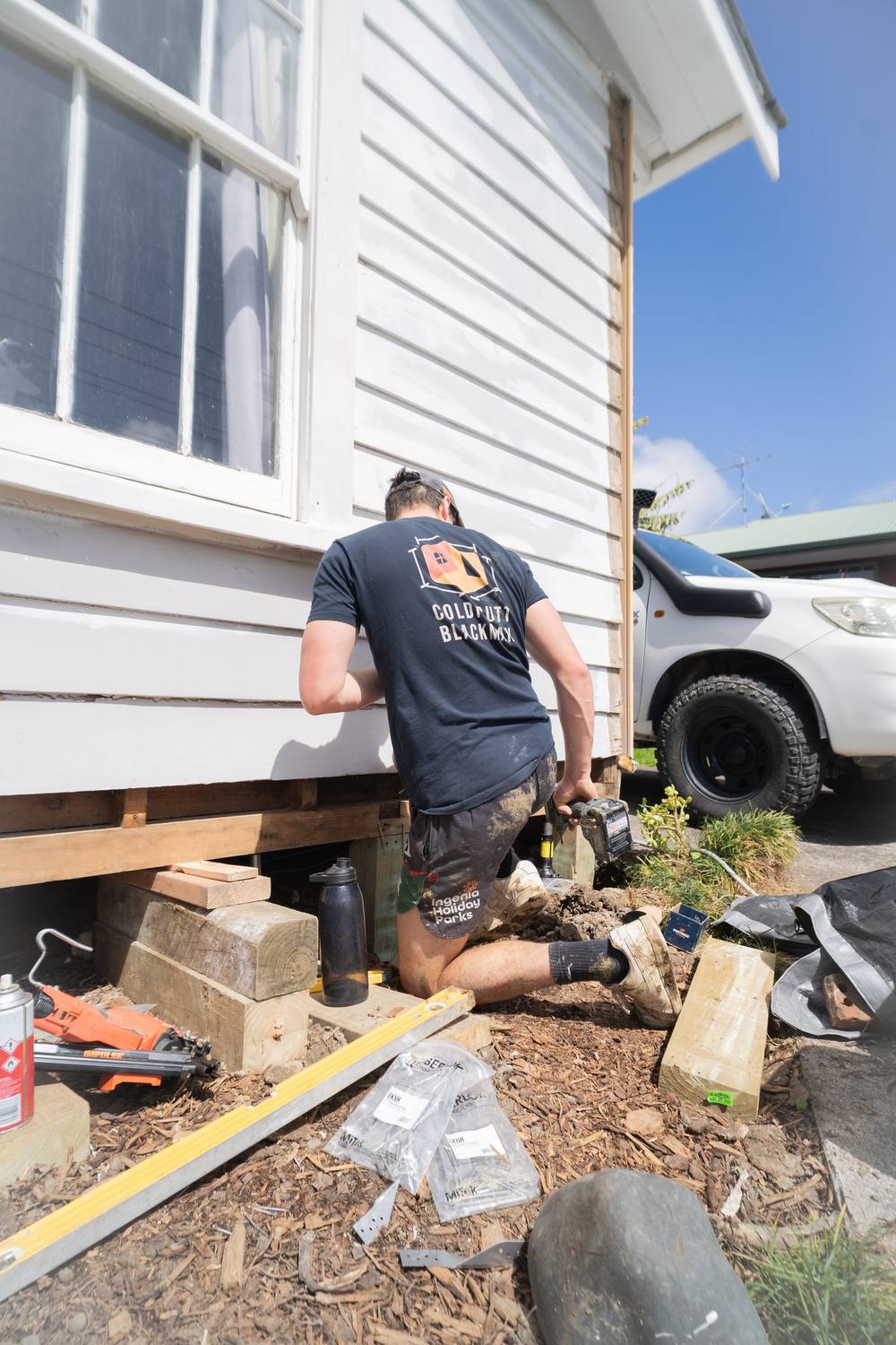 Builder working on a villa's foundations