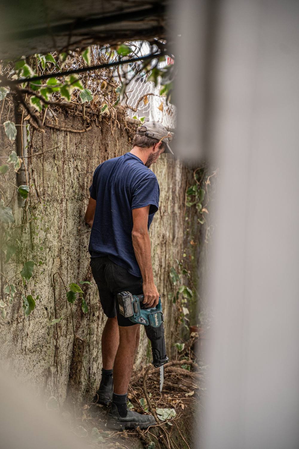 Builder opening up an old wall