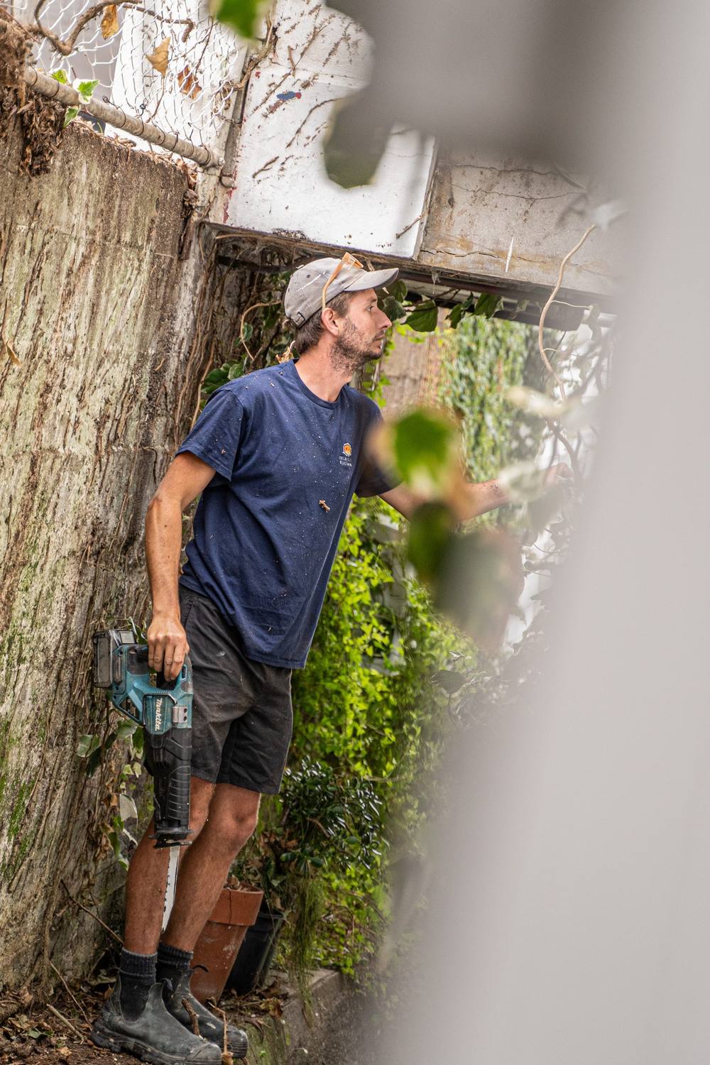 Builder inspecting exposed framing