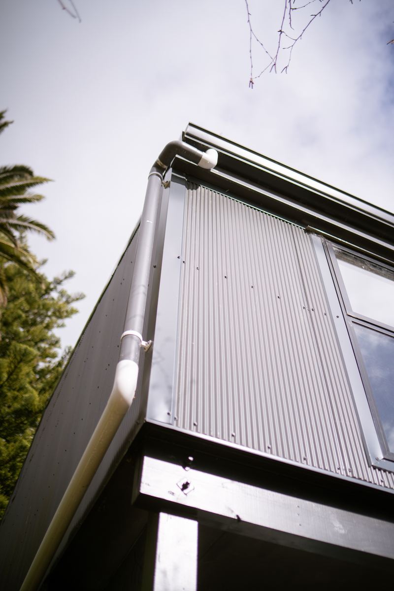 Mini corrugated cladding corner with new downpipe