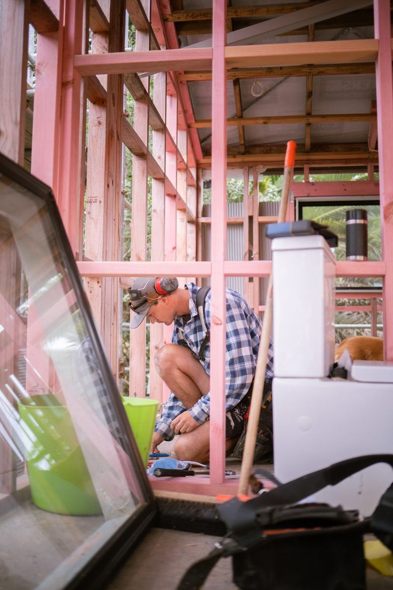 Builder working inside new framing