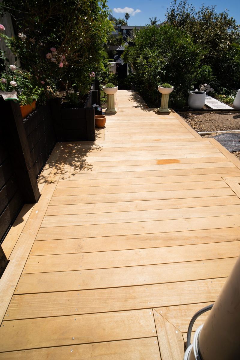 Hardwood deck path through a garden